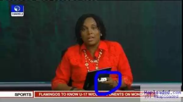 Nigeria in Darkness: Channels TV Presenter Uses Power Bank On Air [PHOTO]